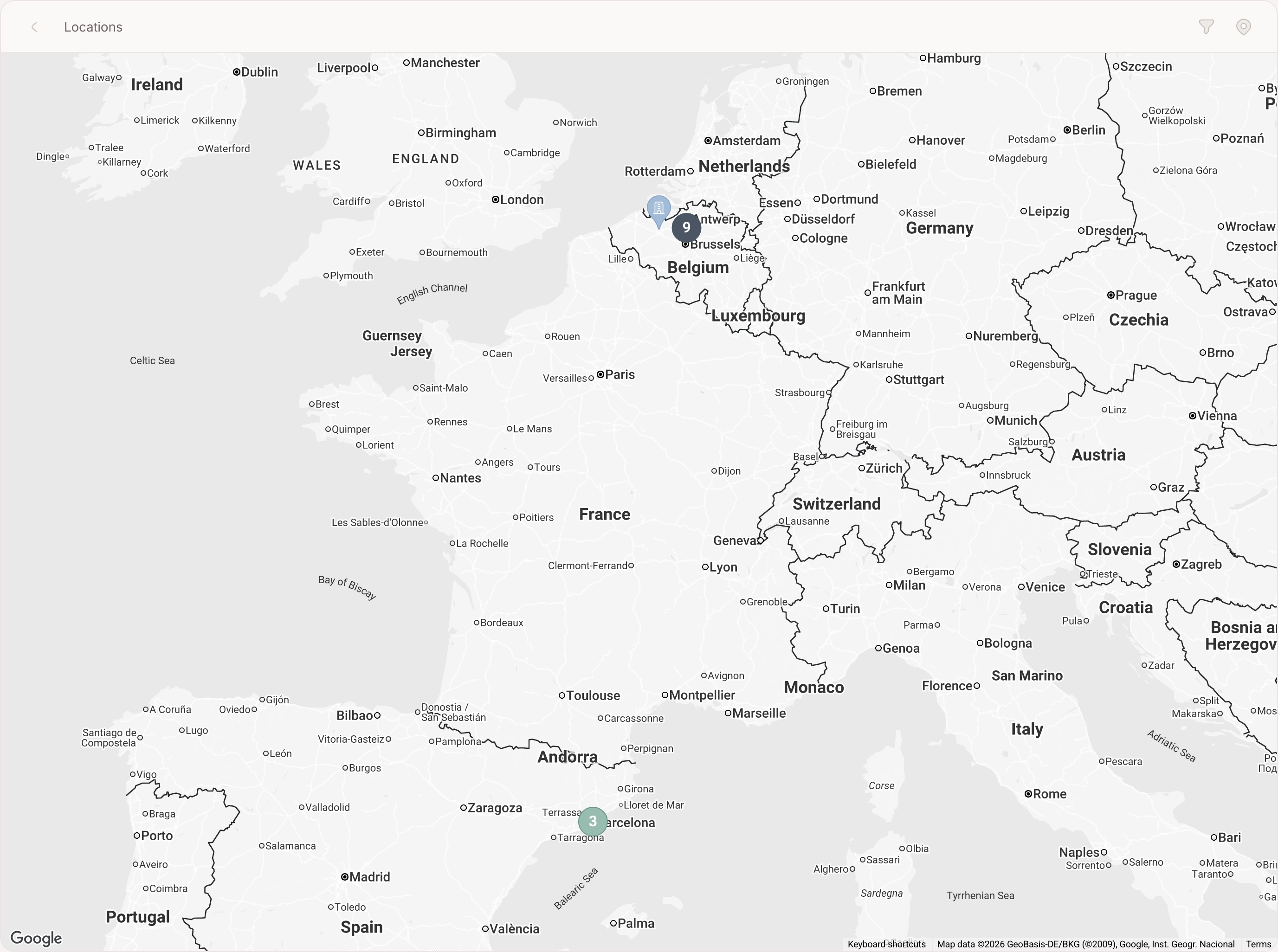 The map with pins coloured by area and a cluster showing a number